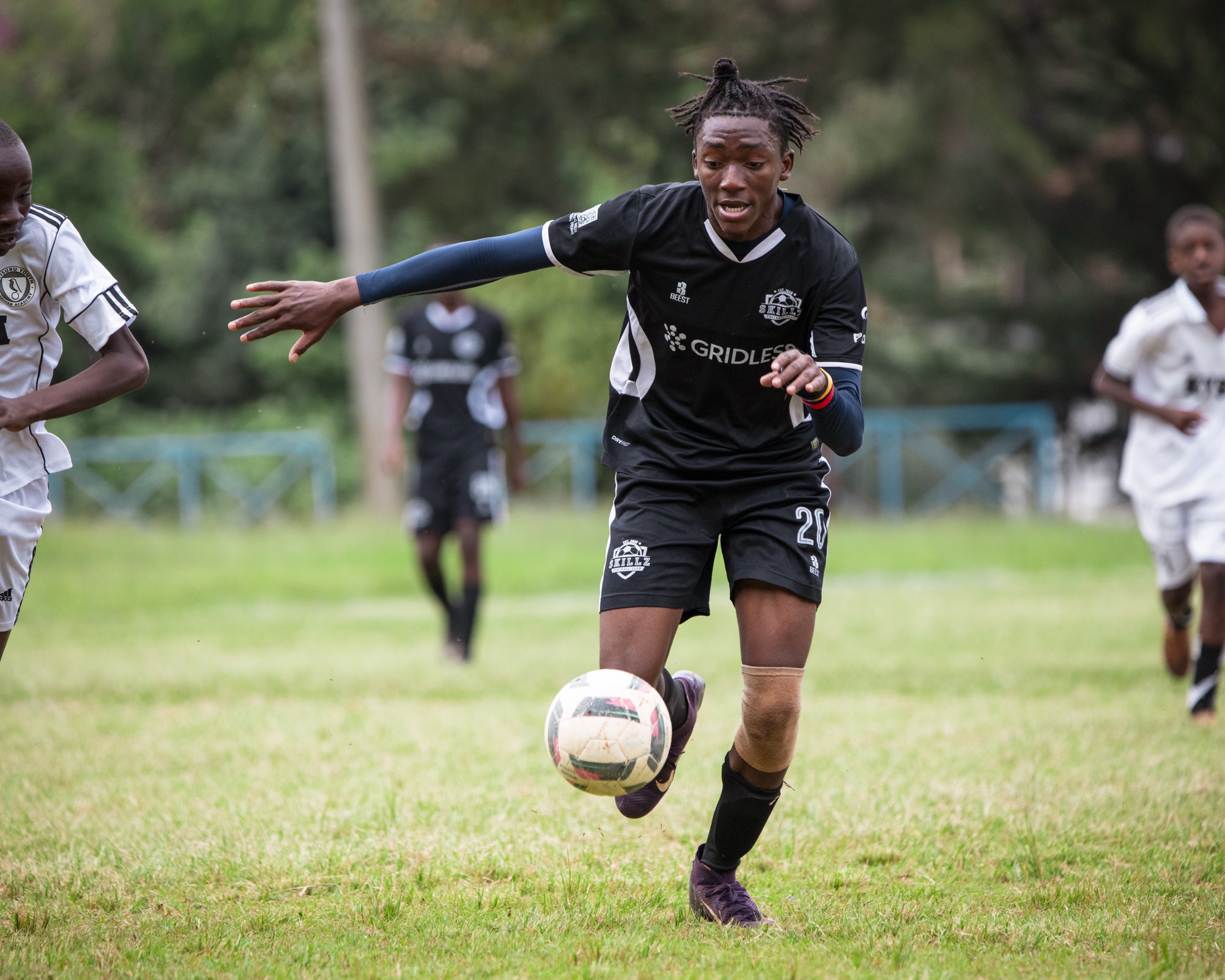 Skillz FC player running with the ball during a match