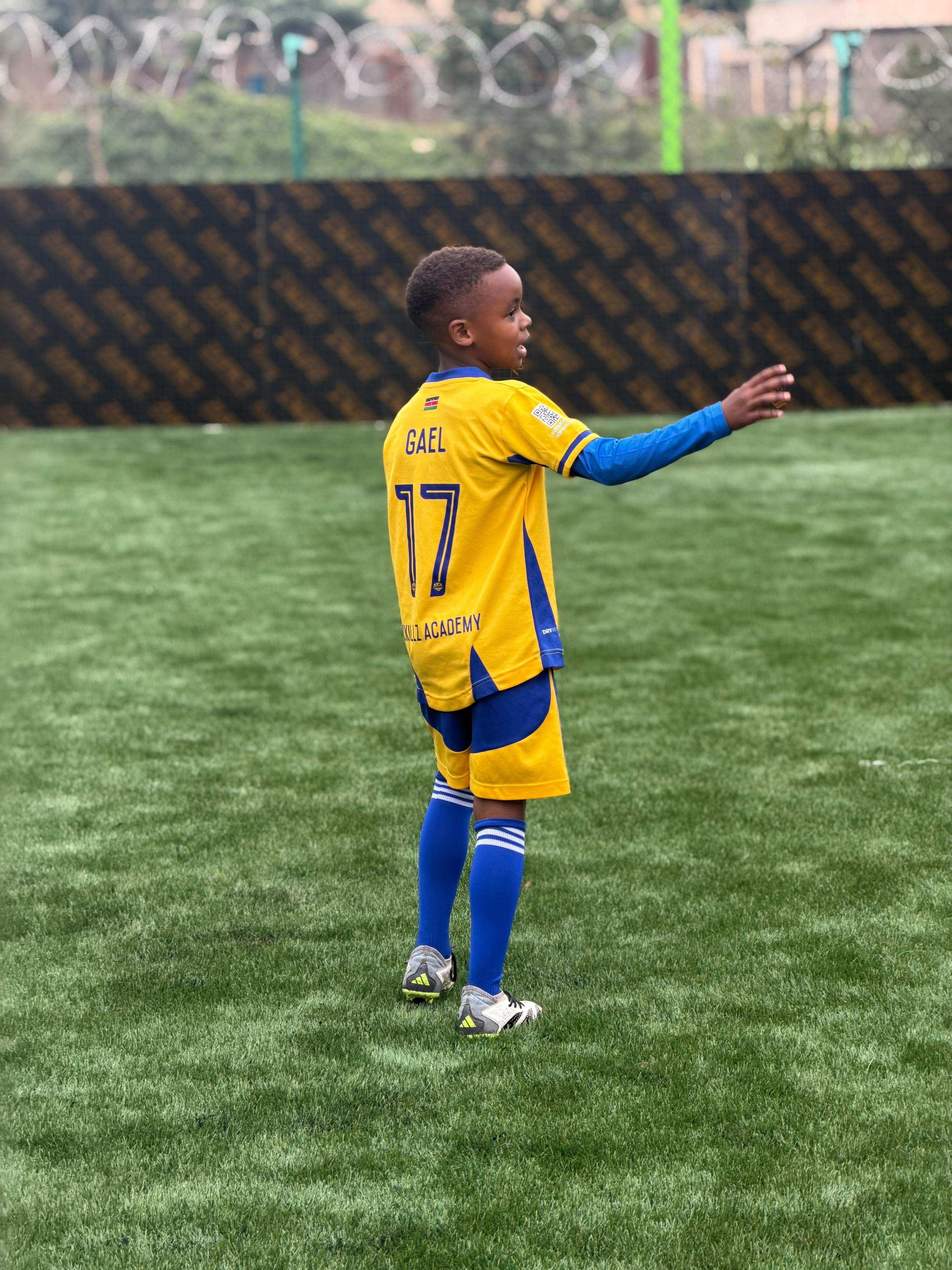Skillz FC Academy player in a yellow kit during training